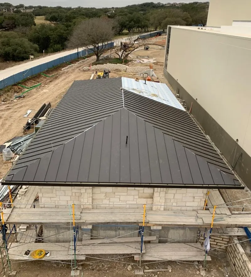 Metal roof new construction with scaffolding in Yeadon